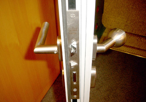 Photo: Front door lock with various security latch techniques
